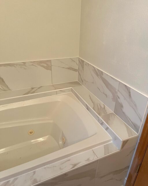Quick upgrade to this floor and tub! 

#boise #boisetile #boisetilecontractor #tile #homerenovation #bathroomremodel #tiledesign #bathtub